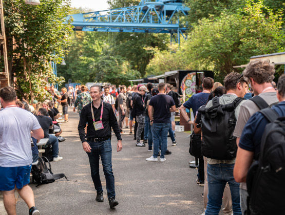 Men walking outside and making queues